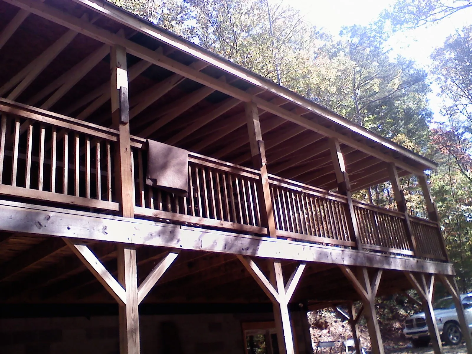 Timber framing under a new elevated porch and deck — Roof Leak Repair in Sussex by Roofing Brothers